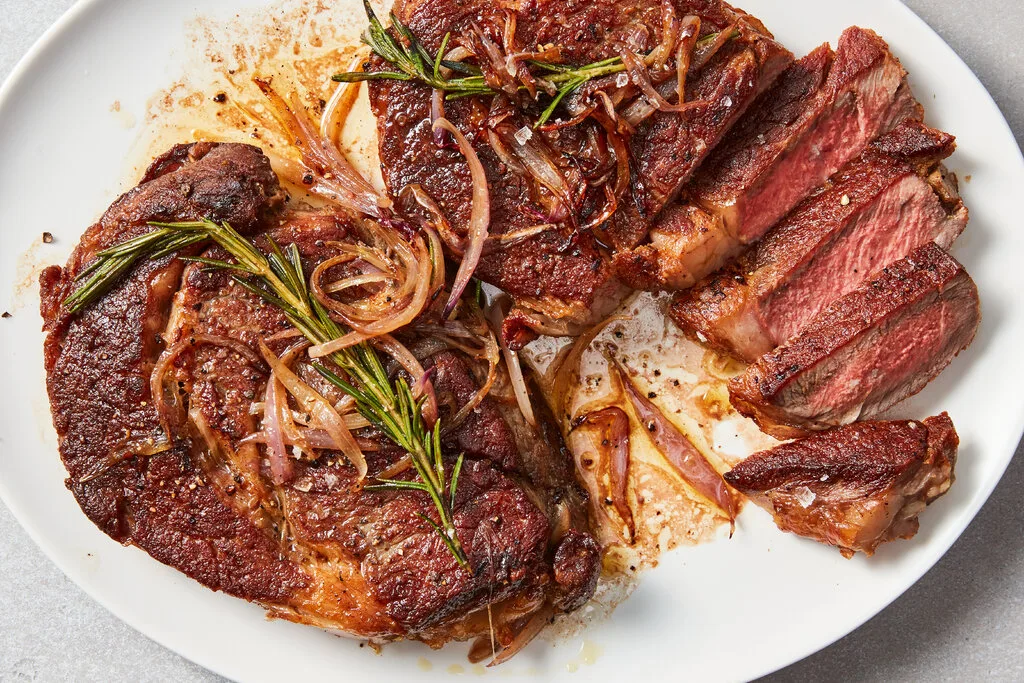 Creole Crusted Rib−Eye Steak With Dirty White Beans