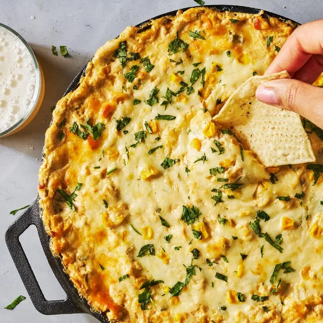 Fire−Roasted Corn Dip With Crispy Flour And Blue Corn Chips