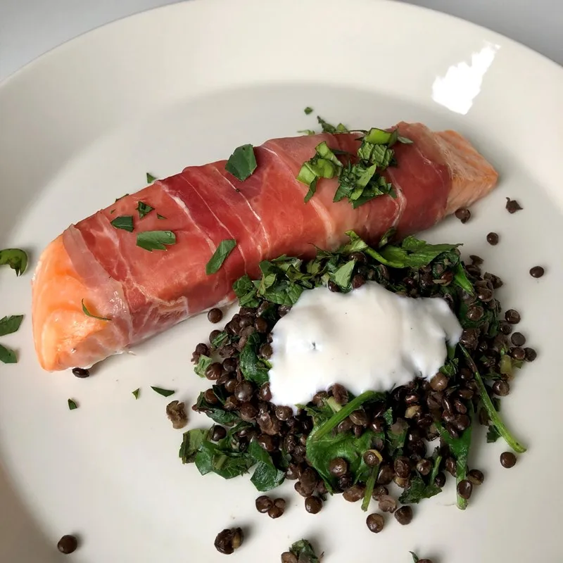 Salmon Fillet Wrapped in Prosciutto with Herby Lentils, Spinach and Yoghurt