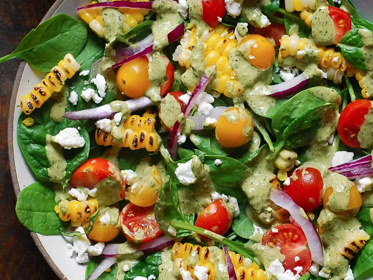 Warm Spinach Salad With A Fire−Roasted Corn Dressing